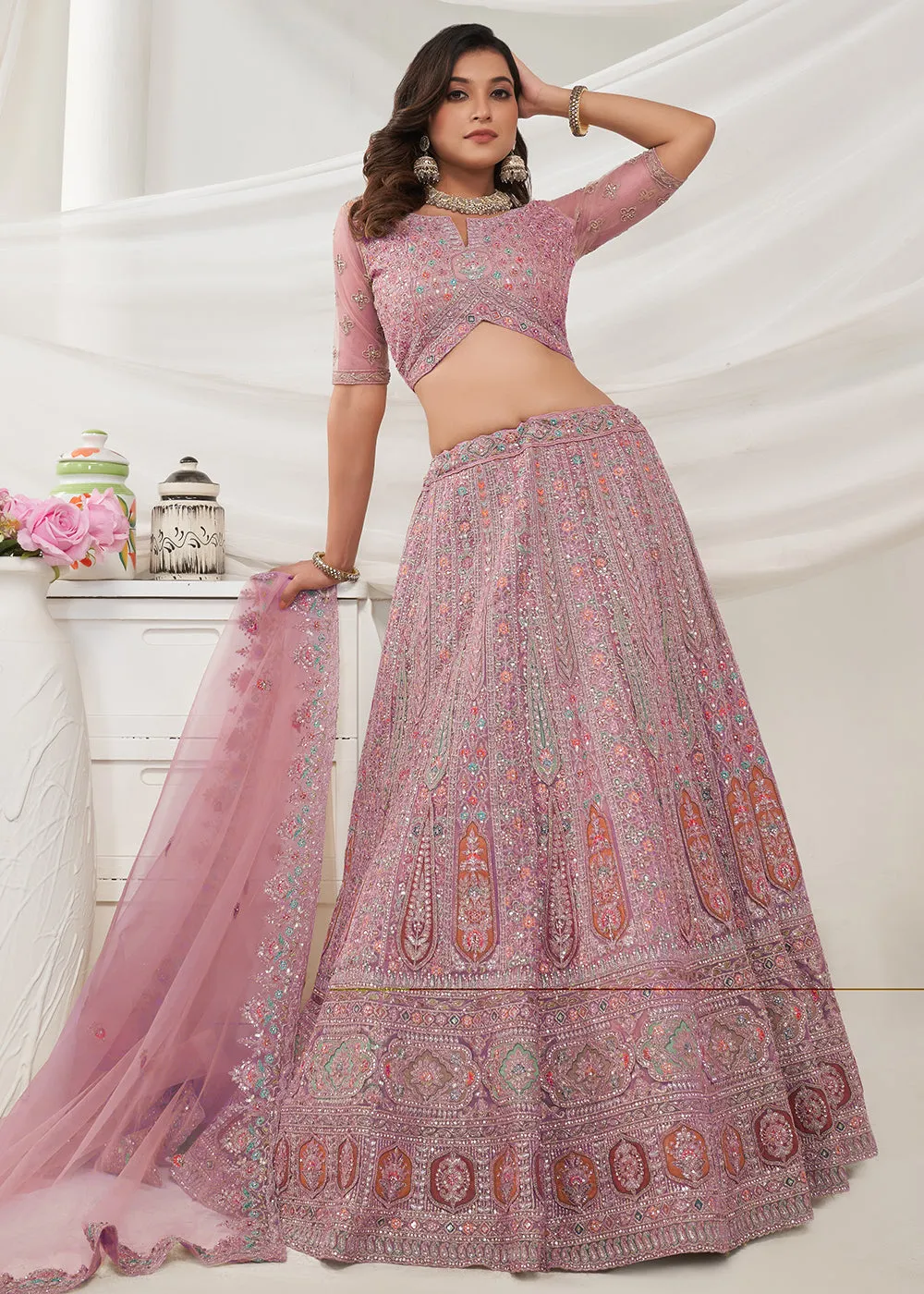 Soft Net Mauve Heavy Embroidered Bridal Style Lehenga Choli