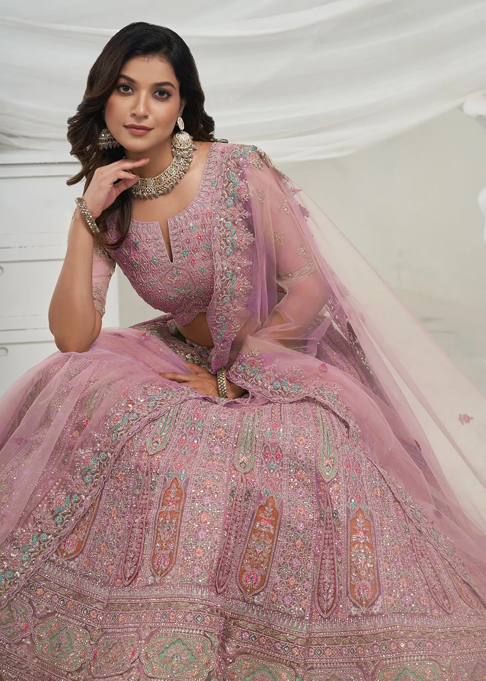 Soft Net Mauve Heavy Embroidered Bridal Style Lehenga Choli